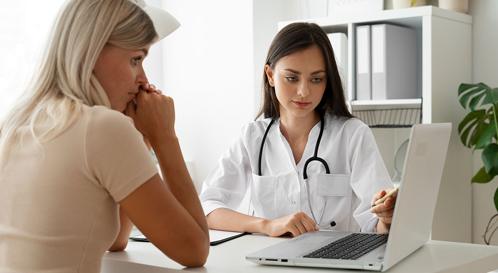 Patient discussing about his medical reports with doctor