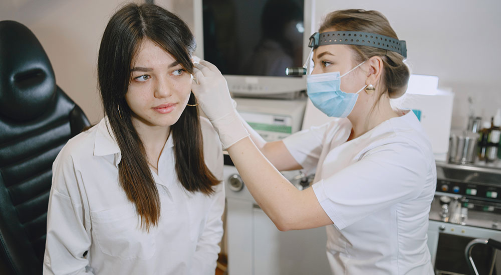 Doctor checking her patient