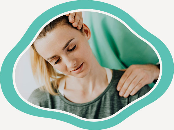 Doctor giving patient spinal adjustment therapy