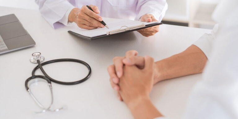 Doctor talking to patient