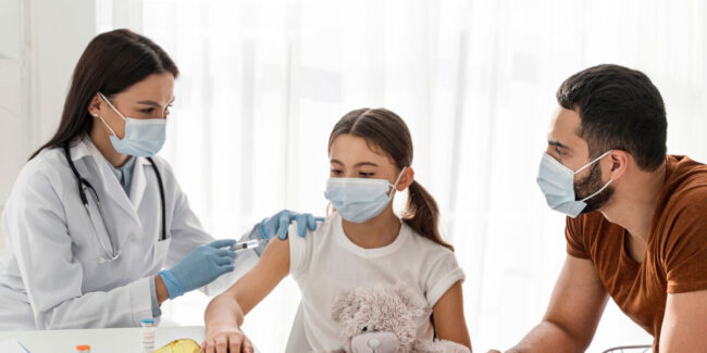 Girl getting vaccinated
