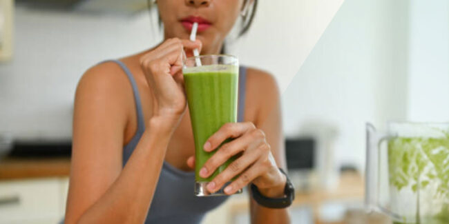 Young Woman Drinking Green Juice