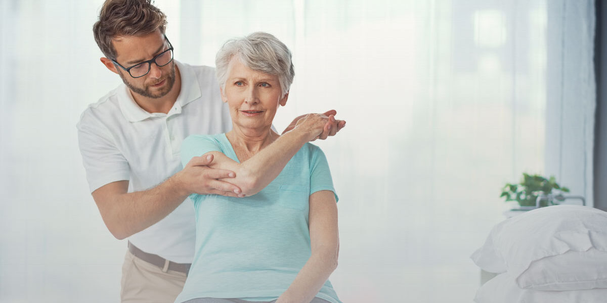 Family medicine physician assessing persistent joint pain with an adult patient.