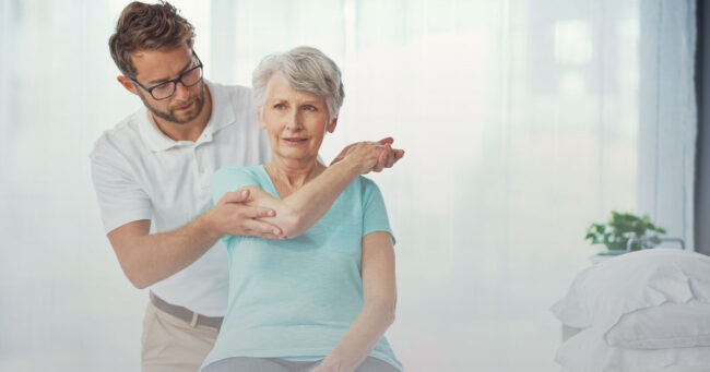 Family medicine physician assessing persistent joint pain with an adult patient.
