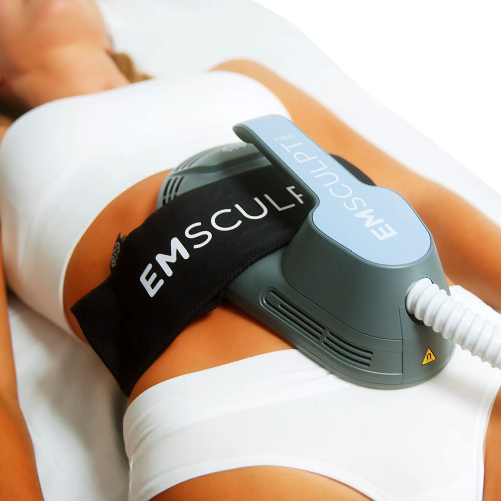 EMSCULPT NEO applicator positioned on a patient's abdomen for body contouring treatment.